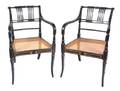 A Pair of Regency Style Black and Gold Painted Open Armchairs