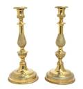 A Pair of French Empire Style Brass Candlesticks