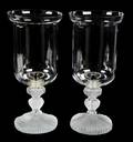 A Pair of Lalique Molded and Frosted Glass Hurricane Lamps