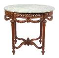 A Louis XVI Style Carved Fruitwood Marble Top Center Table