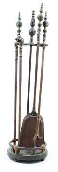 A Set of Brass Fireplace Tools on Stand