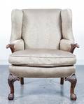 An Upholstered Wingback Armchair