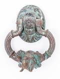 A Patinated Bronze Door Knocker