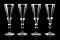 A Set of Four Venetian Glass Champagne Flutes