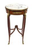 A Louis XVXVI Transitional Style Gilt Bronze Mounted Parquetry Table