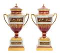 A Pair of Royal Vienna Porcelain Urns Covers and Stands