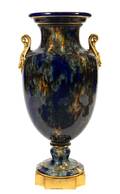 A Sevres Gilt Bronze Mounted Porcelain Urn