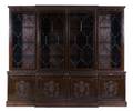 A Regency Carved Mahogany Breakfront Bookcase