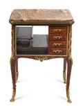 A Louis XV Style Gilt Bronze Mounted Kingwood and Parquetry Stationery Table