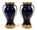 A Pair of French Gilt Bronze Mounted Cobalt Glazed Ceramic Urns