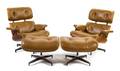 A Pair of Charles and Ray Eames for Herman Miller Leather Upholstered Lounge Chairs and Ottomans