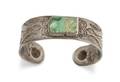 A Navajo Stamped Turquoise and Silver Bracelet