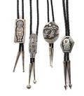 Four Southwestern Silver Bolos