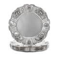 A Set of Seven American Silver Bread Plates