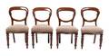 A Set of Four Victorian Walnut Side Chairs