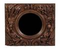 A Victorian Carved Walnut Bullseye Mirror