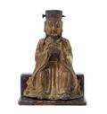 A Chinese Bronze Figure of a Seated Daoist Immortal