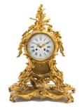 A Louis XV Style Gilt Bronze Mantel Clock