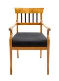 A Biedermeier Parcel Ebonized Fruitwood Armchair