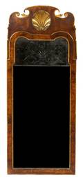 A Chippendale Style Parcel Gilt Walnut Mirror