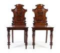 A Pair of William IV Mahogany Hall Chairs