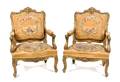 A Pair of Louis XV Style Giltwood Fauteuils