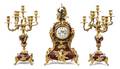 A Louis XV Style Gilt Bronze Mounted Marble Clock Garniture