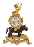 A Louis XV Style Gilt and Patinated Bronze Figural Mantel Clock