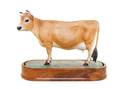 A Royal Worcester Porcelain Model of a Jersey Cow