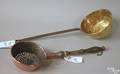 Copper strainer with wooden handle together with a brass and iron ladle