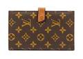 A Louis Vuitton Monogrammed Canvas Wallet