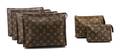 A Group Of Six Louis Vuitton Monogram Canvas Accessory Pouches