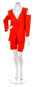 An Issey Miyake Orange Knit Cutout Ensemble