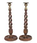 A Pair of English Oak and Brass Candlesticks