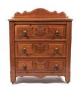 A Victorian Walnut Chest of Drawers