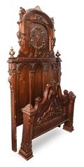 A Renaissance Revival Walnut Bed