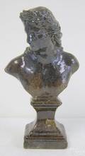 Earthenware bustlength sculpture of a man with mottled brown glaze