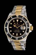 A Stainless Steel and Yellow Gold Ref 16803 Submariner Wristwatch Rolex Circa 1984