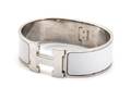 An Hermes Clic Clac White Enamel and Silver Bracelet