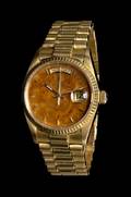 An 18 Karat Yellow Gold Ref 18038 Oyster Perpetual DayDate Wristwatch with Birch Dial Rolex