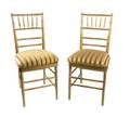 A Set of Fourteen Gilt Painted Wood Side Chairs