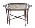 A Decorative Silverplate Tray on Bamboo Stand