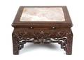 A Chinese Export Carved Rosewood Low Pedestal