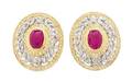 A Pair of 18 Karat Bicolor Gold Ruby and Diamond Laurel Motif Earclips Mario Buccellati