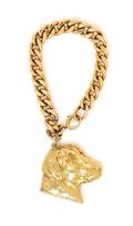 A Yellow Gold Curb Link Bracelet with Attached 14 Karat Yellow Gold Labrador Show Dog Locket Charm Circa 1950s