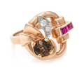 A Retro 14 Karat Rose Gold Platinum Colored Diamond Diamond and Ruby Ring