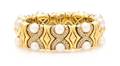 A Yellow Gold Pearl and Diamond Flexible Cuff Bracelet