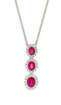 An 18 Karat White Gold Ruby and Diamond Pendant Spark