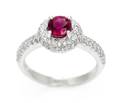 An 18 Karat White Gold Ruby and Diamond Ring