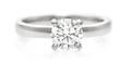 A 14 Karat White Gold and Diamond Solitaire Ring